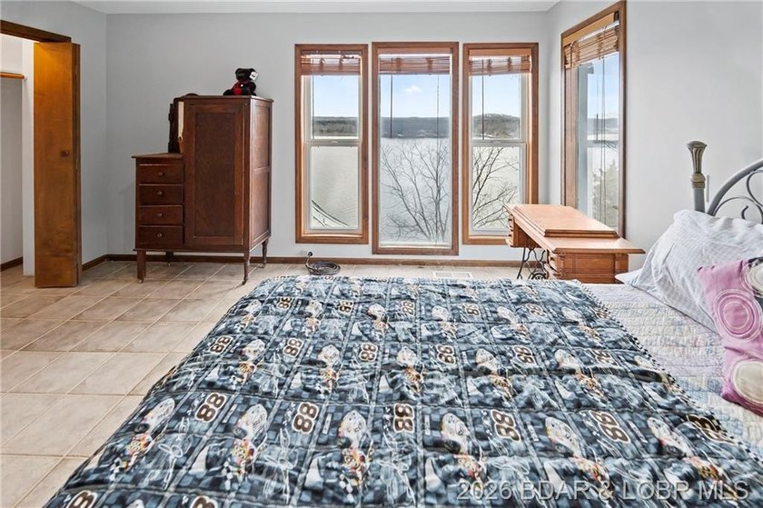WOW! From the minute you walk in the door, the lake view is - photo 27