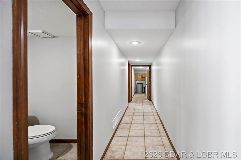 WOW! From the minute you walk in the door, the lake view is - photo 29