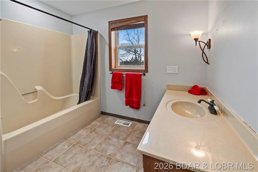WOW! From the minute you walk in the door, the lake view is - photo 31