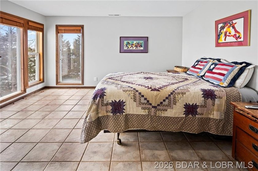 WOW! From the minute you walk in the door, the lake view is - photo 34