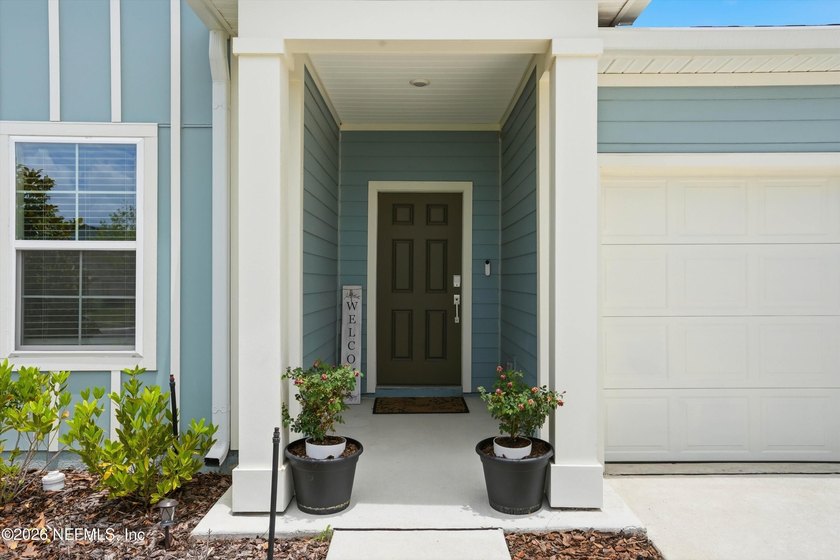 Welcome to this beautifully maintained pond-view home in the - photo 5