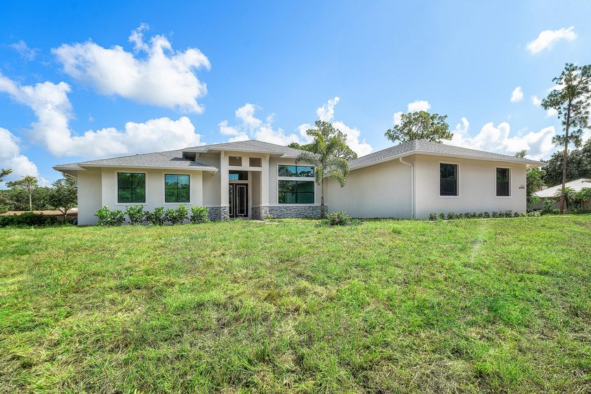 Exceptional new construction in Jupiter Farms with high-end - photo 4