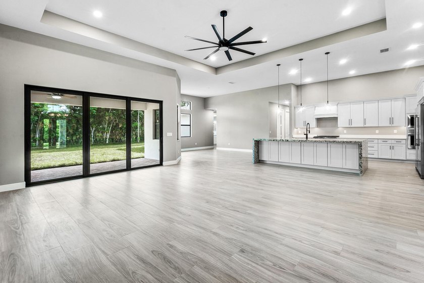 Exceptional new construction in Jupiter Farms with high-end - photo 7