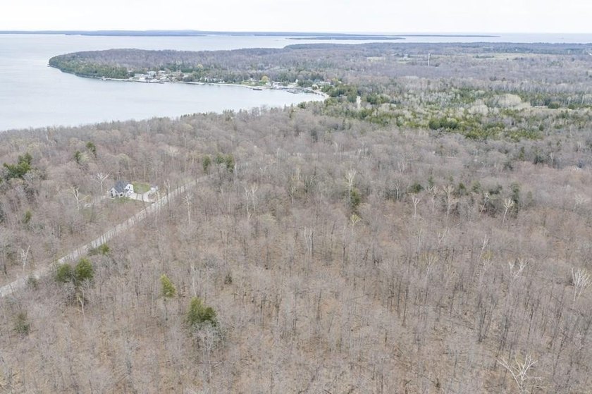 Beautifully wooded lot within a short distance to Waterview - photo 2
