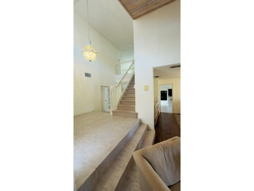 This is a spacious 2 story home on the lake in Villa D Este, a - photo 16