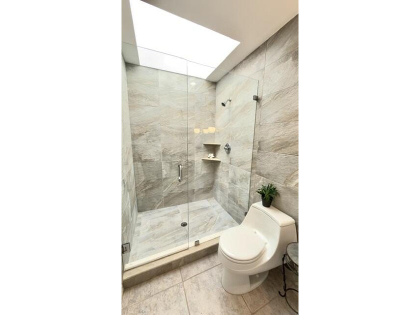 This is a spacious 2 story home on the lake in Villa D Este, a - photo 30