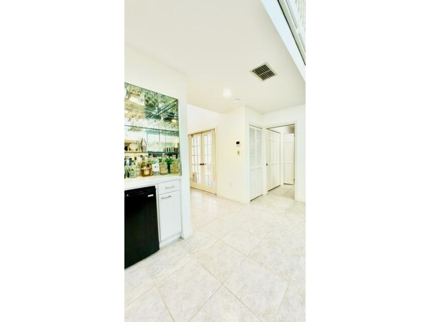 This is a spacious 2 story home on the lake in Villa D Este, a - photo 34