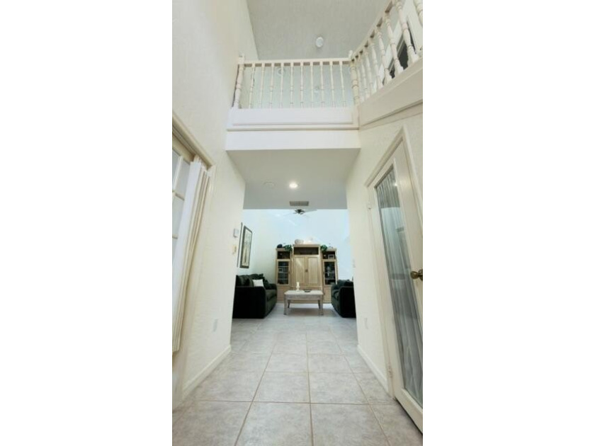 This is a spacious 2 story home on the lake in Villa D Este, a - photo 36