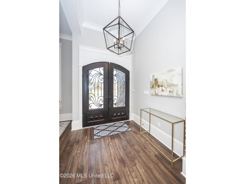 Welcome to this stunning custom-built home in the highly - photo 11