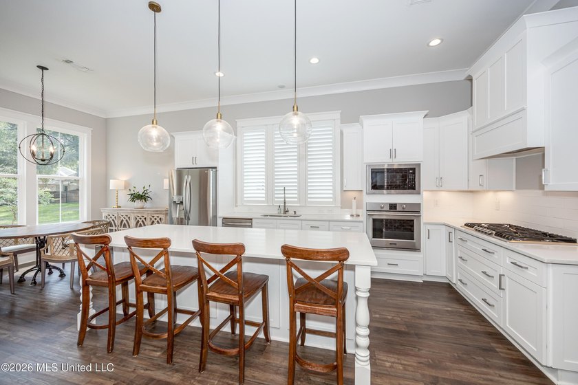 Welcome to this stunning custom-built home in the highly - photo 19