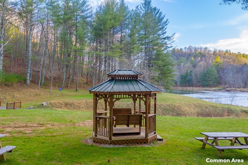 Experience the ultimate riverside retreat on this premier 5-acre - photo 22