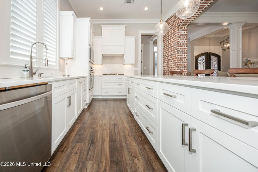 Welcome to this stunning custom-built home in the highly - photo 23
