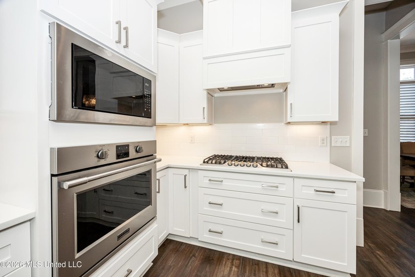 Welcome to this stunning custom-built home in the highly - photo 24