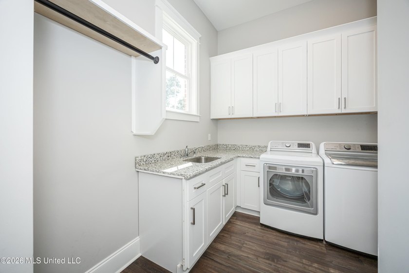 Welcome to this stunning custom-built home in the highly - photo 29
