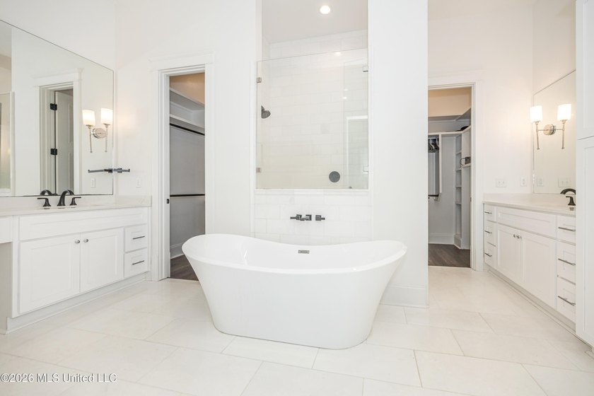 Welcome to this stunning custom-built home in the highly - photo 42
