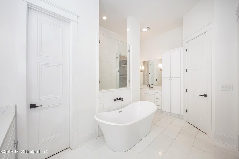 Welcome to this stunning custom-built home in the highly - photo 46