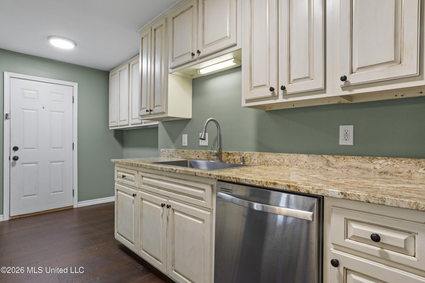 Welcome home to this beautifully updated 4-bedroom, 2-bath - photo 13