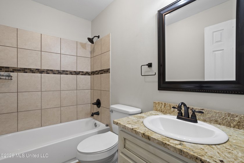 Welcome home to this beautifully updated 4-bedroom, 2-bath - photo 26