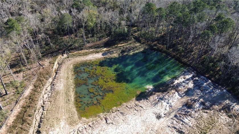This 8.35-acre tract on Timber Trail sits right in the heart of - photo 2