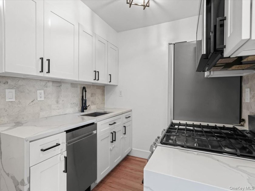 Welcome to this turnkey semi-detached two-unit home with - photo 24