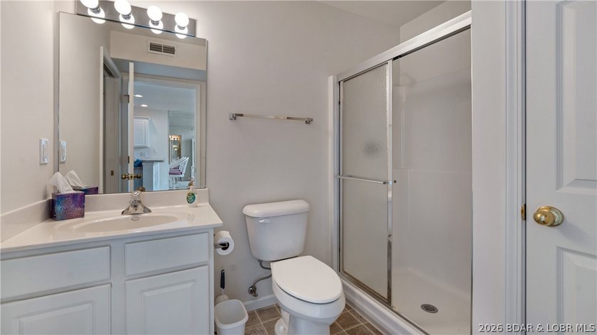 Discover this top-floor 3-bedroom, 3-bathroom condo with a - photo 12