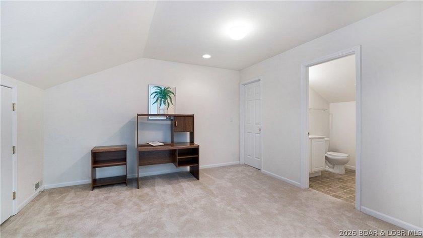 Discover this top-floor 3-bedroom, 3-bathroom condo with a - photo 19