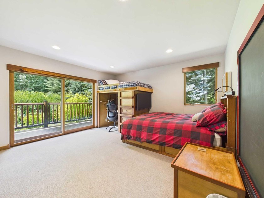 Tucked along a half-acre parcel bordering the Bigwood River - photo 23