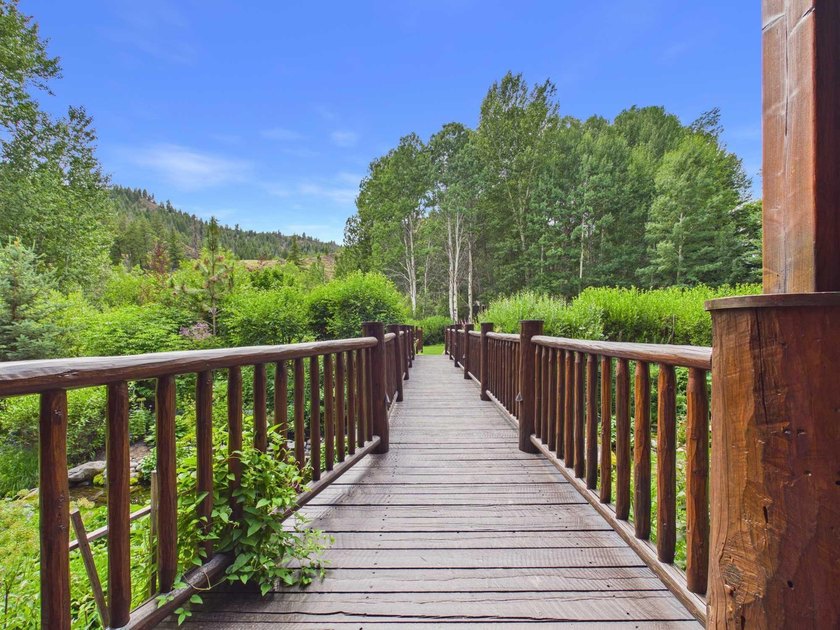 Tucked along a half-acre parcel bordering the Bigwood River - photo 25