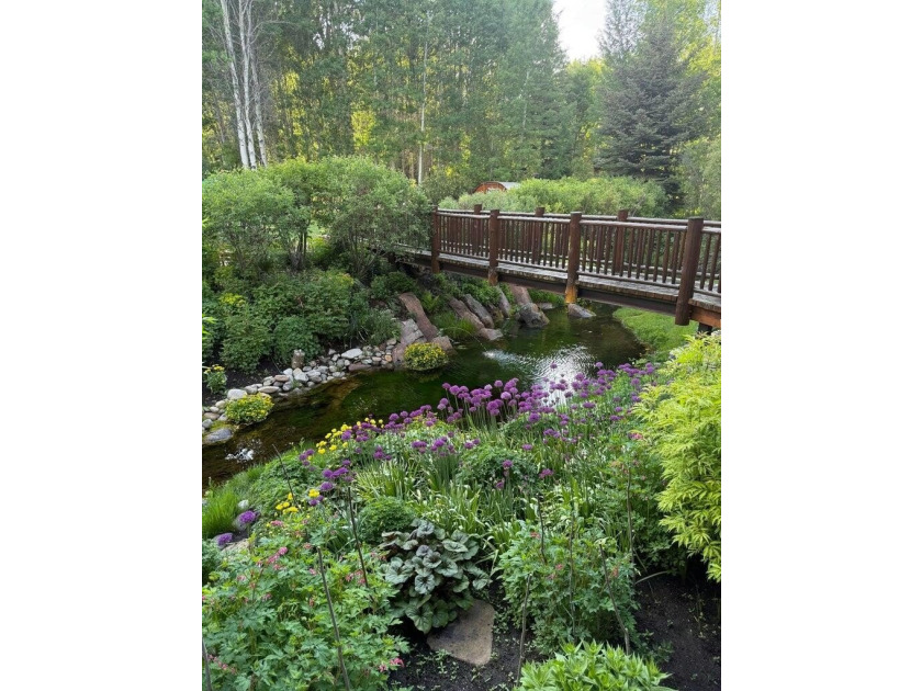Tucked along a half-acre parcel bordering the Bigwood River - photo 27