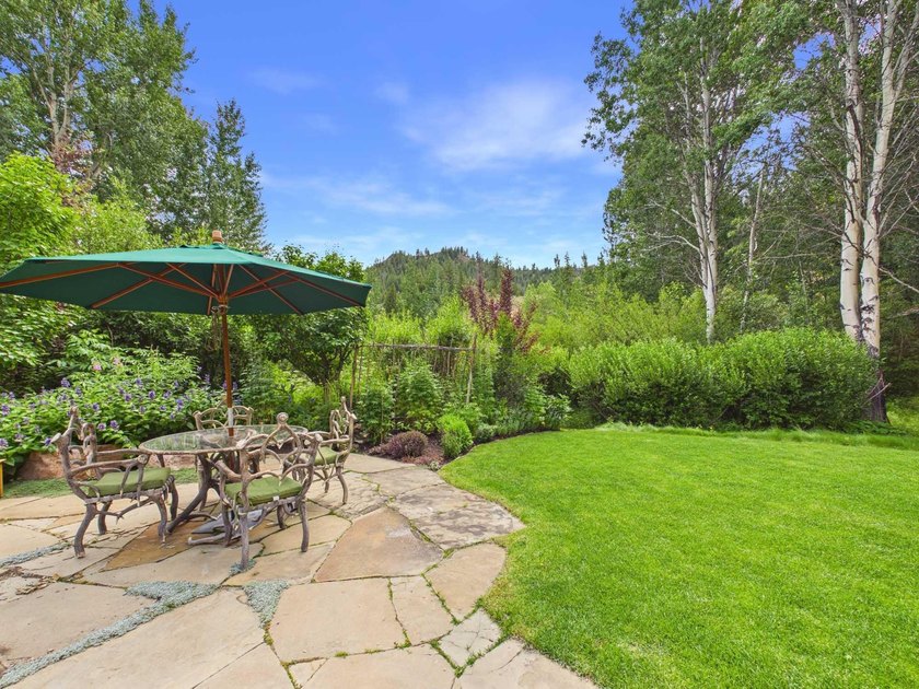 Tucked along a half-acre parcel bordering the Bigwood River - photo 28
