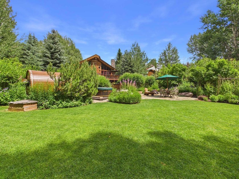Tucked along a half-acre parcel bordering the Bigwood River - photo 30