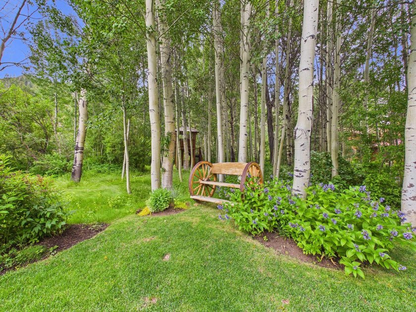 Tucked along a half-acre parcel bordering the Bigwood River - photo 31