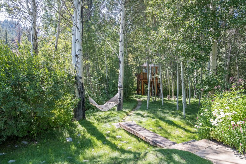 Tucked along a half-acre parcel bordering the Bigwood River - photo 32