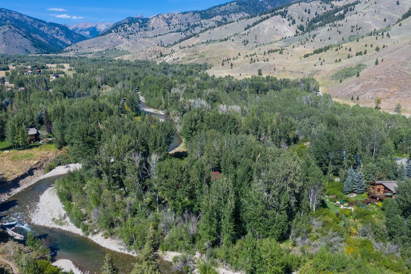 Tucked along a half-acre parcel bordering the Bigwood River - photo 36