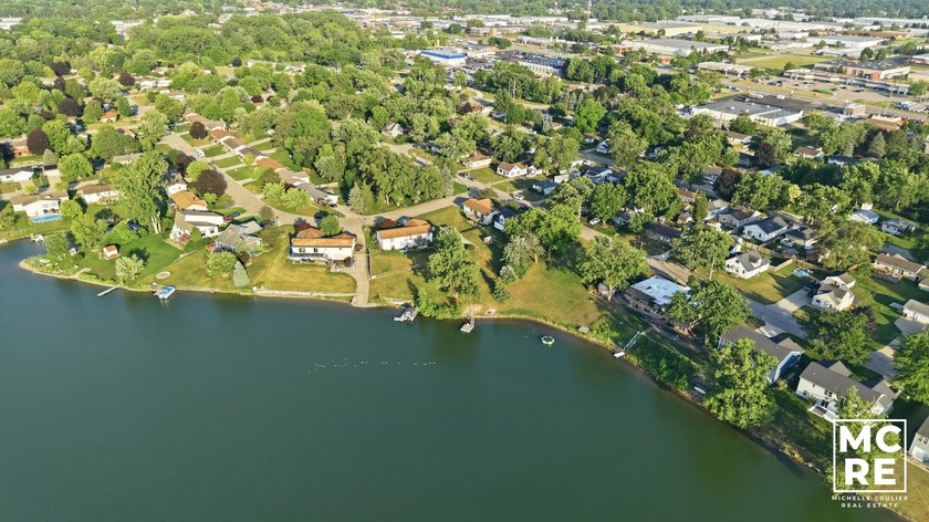 Experience the perfect blend of tranquil lakefront living and - photo 11