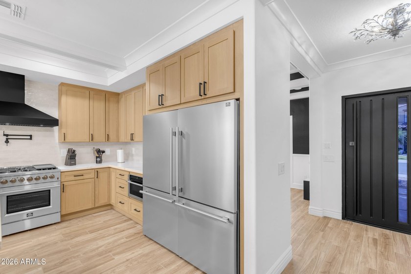 Why wait 18 months to build custom when you can move into a - photo 14