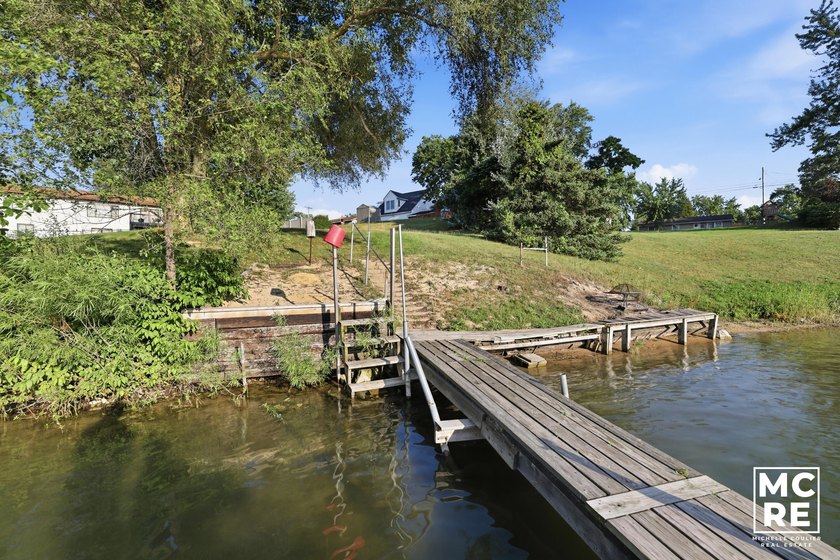 Experience the perfect blend of tranquil lakefront living and - photo 41