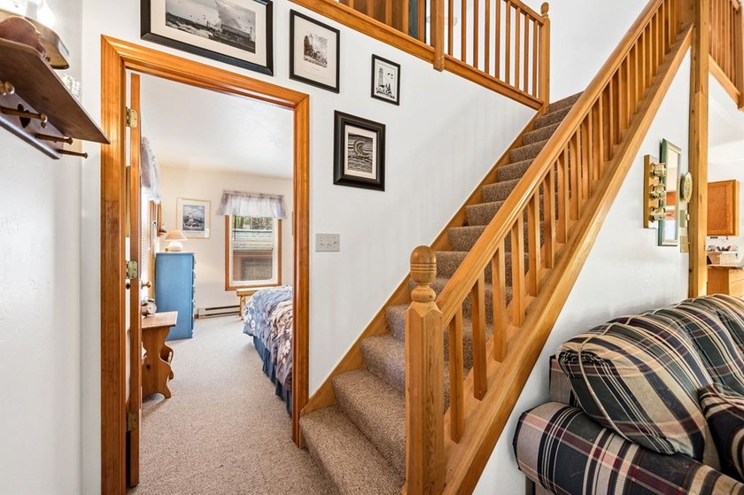 Tucked away in the woods and just a short walk from deeded water - photo 4