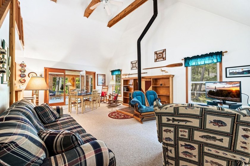 Tucked away in the woods and just a short walk from deeded water - photo 6