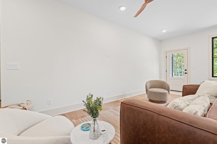 Experience elevated luxury in this brand-new, ground-floor condo - photo 6