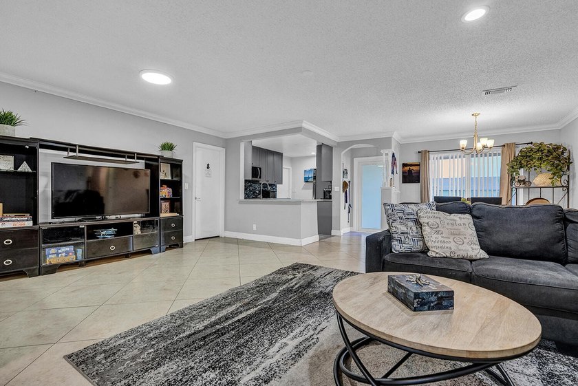 Welcome to this charming 3-bedroom, 2-bath single-family home in - photo 12