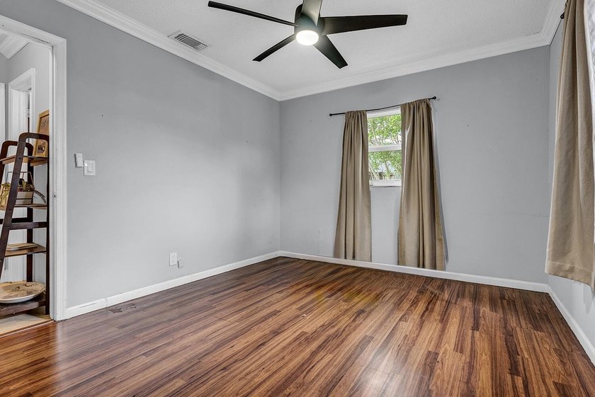 Welcome to this charming 3-bedroom, 2-bath single-family home in - photo 15