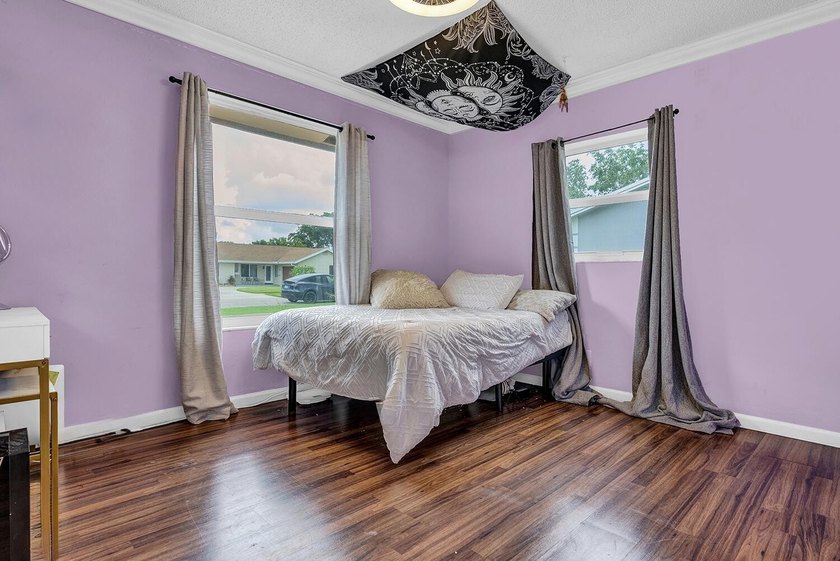 Welcome to this charming 3-bedroom, 2-bath single-family home in - photo 17