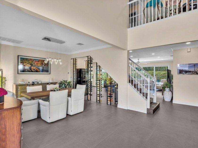 Beautifully updated 5-bedroom, 3-bath, 3-car garage home with - photo 4
