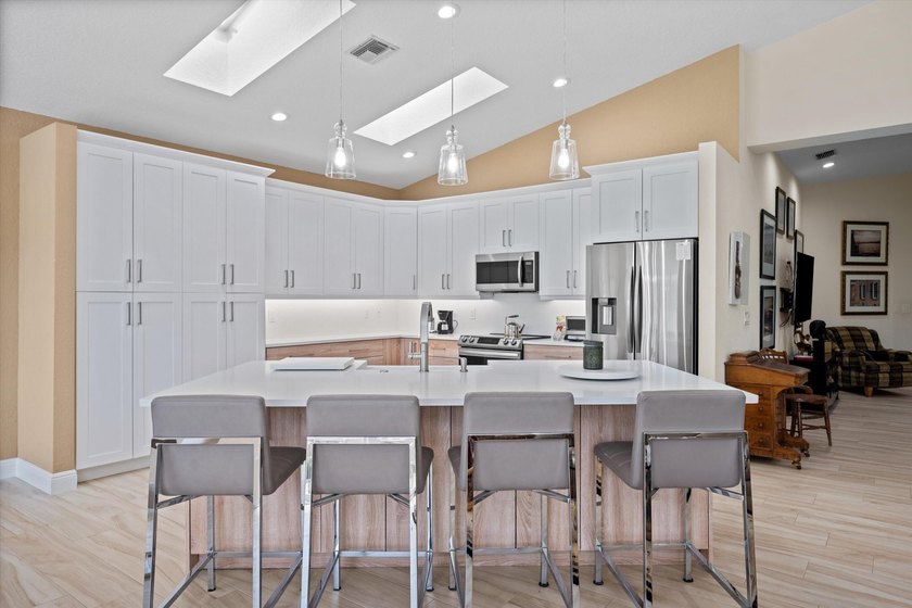 Fully renovated and move-in ready, this stunning villa offers - photo 9