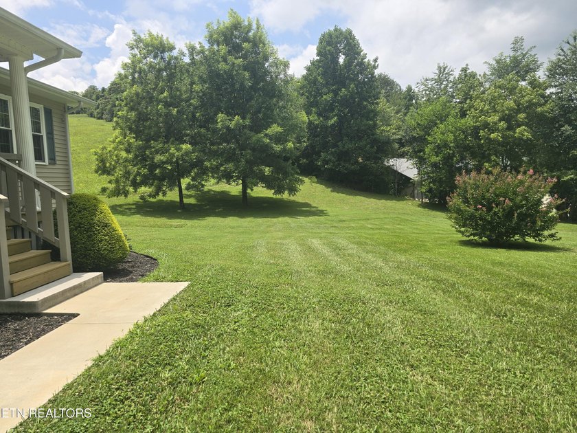 This adorable, fully updated 3 bedroom, 2 full bath home sits on - photo 5