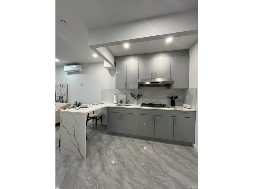 The brand-new luxury condo building in Borough Park features an - photo 13