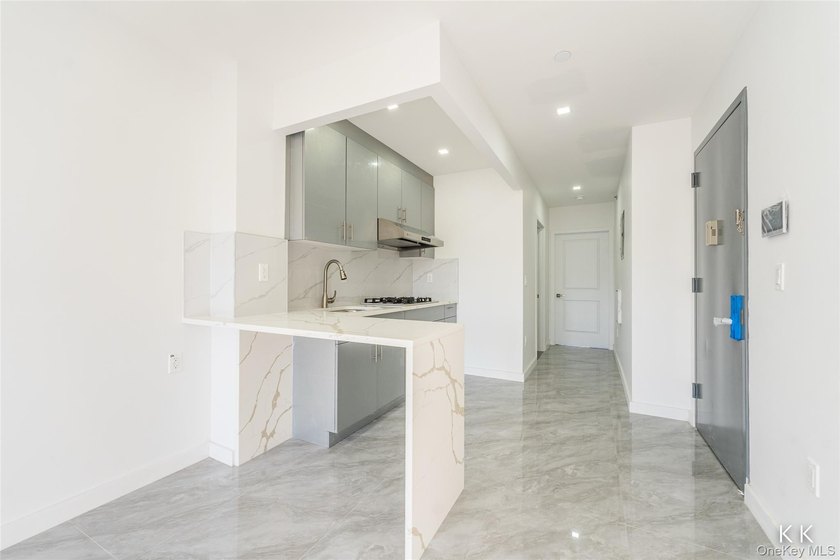 The brand-new luxury condo building in Borough Park features an - photo 15
