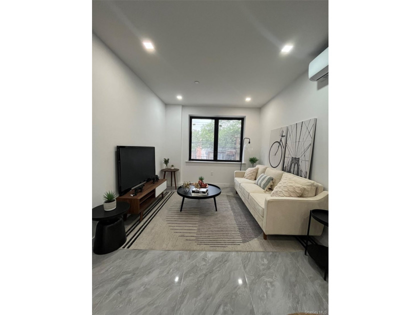 The brand-new luxury condo building in Borough Park features an - photo 18