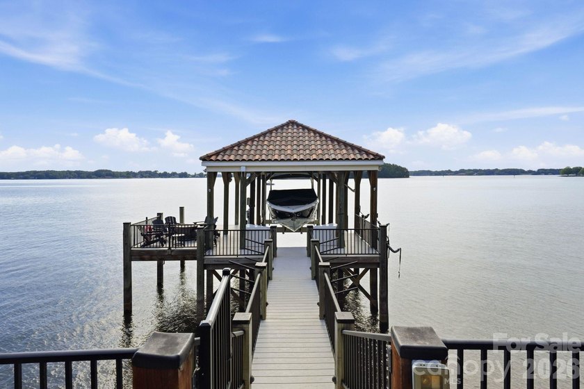 Perched elegantly above Lake Norman's eastern shore and uniquely - photo 46